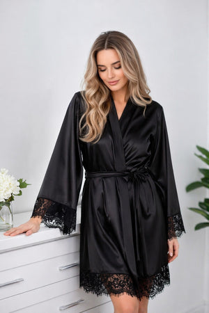Woman's black satin robe with lace cuffs and hem