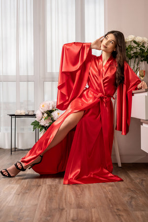 Romantic red satin robe with dramatic sleeves