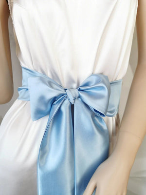 Light blue satin waist belt with flowing bow tails