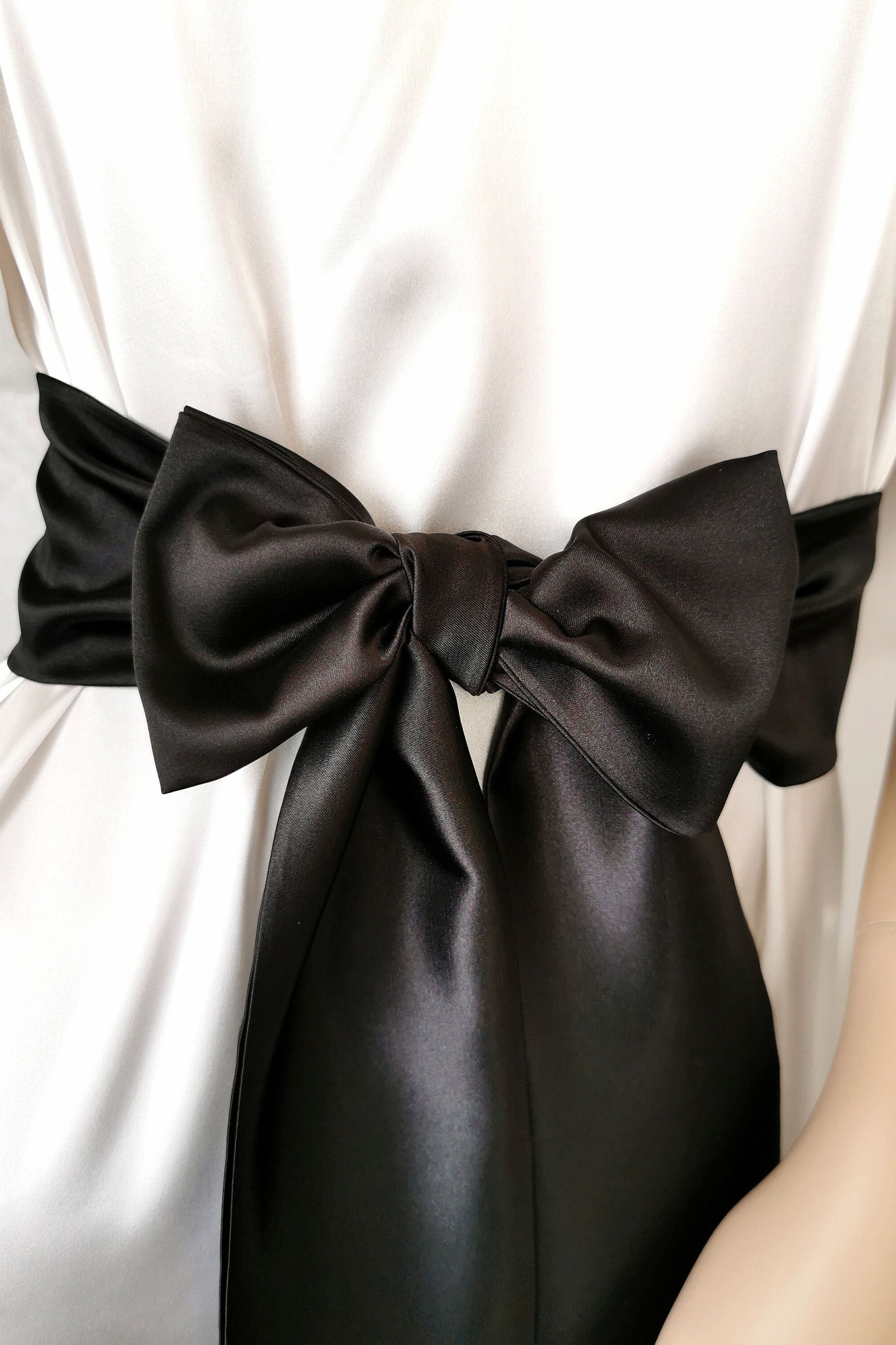 Classic black satin waist belt with flowing bow tails