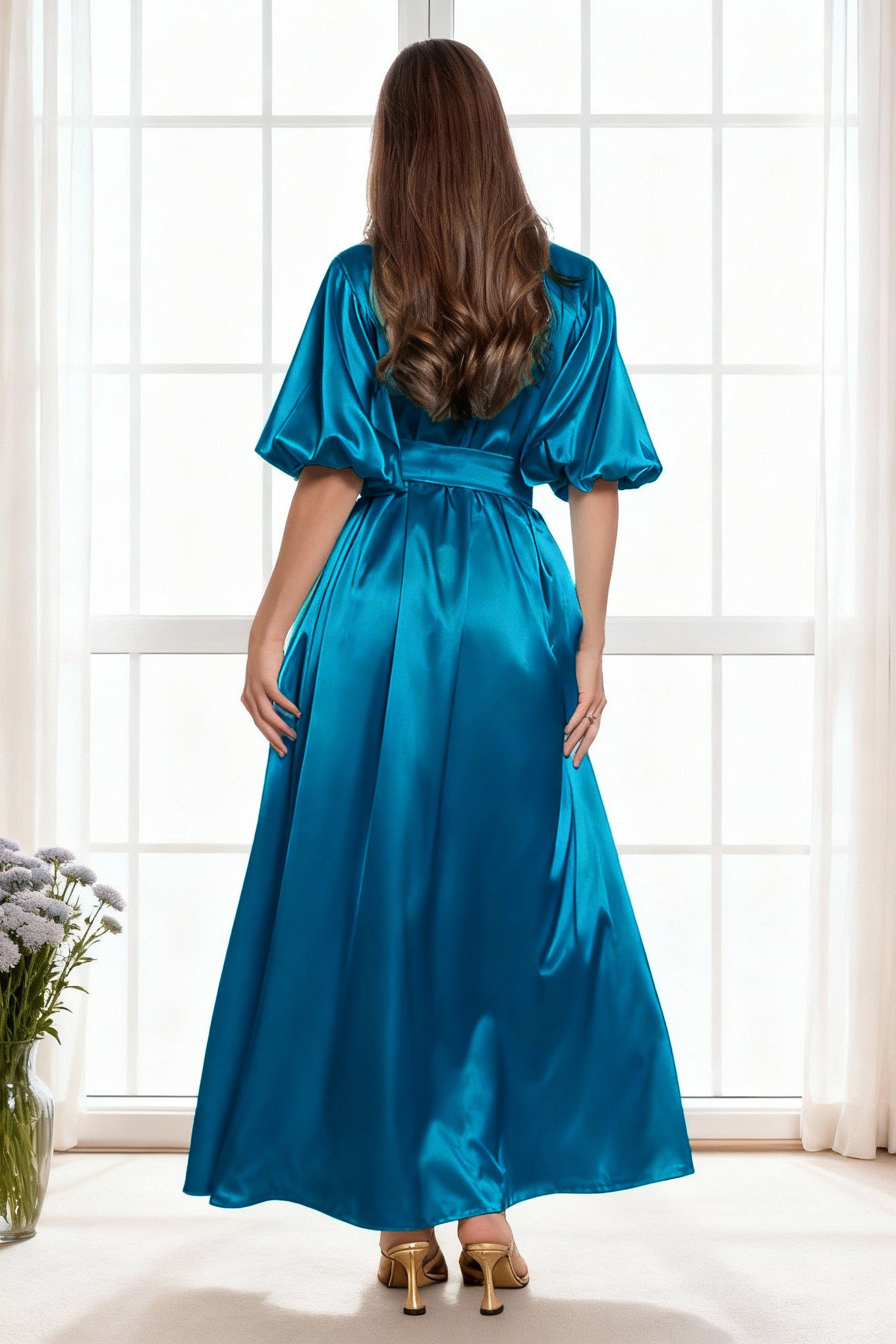 Woman wearing a blue satin dress