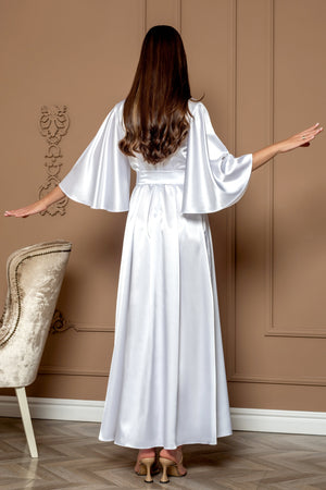 Woman wearing a white satin robe