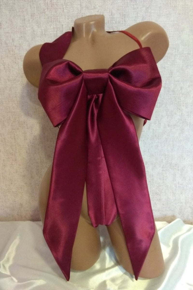 A wine satin body bow with a looped design over the shoulder and tied bow