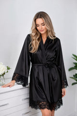 Woman's black satin robe with lace cuffs and hem
