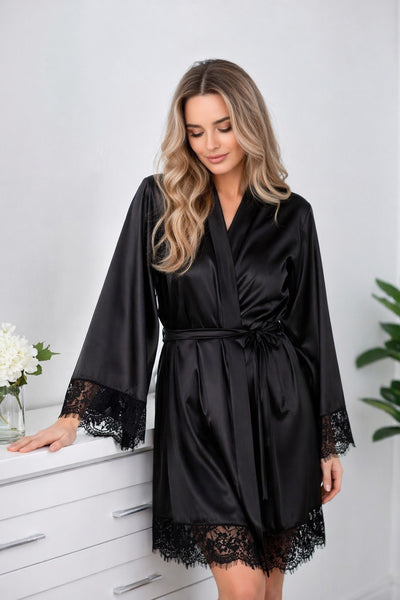 Woman's black satin robe with lace cuffs and hem