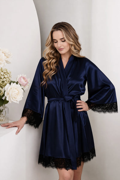 Woman's navy blue robe with lace cuffs and hem