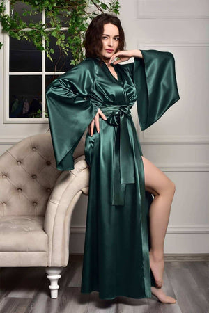 Alluring bridesmaid robe in a captivating shade of green, adding a pop of color to wedding festivities