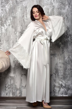 Woman wearing a ivory satin bridal kimono robe