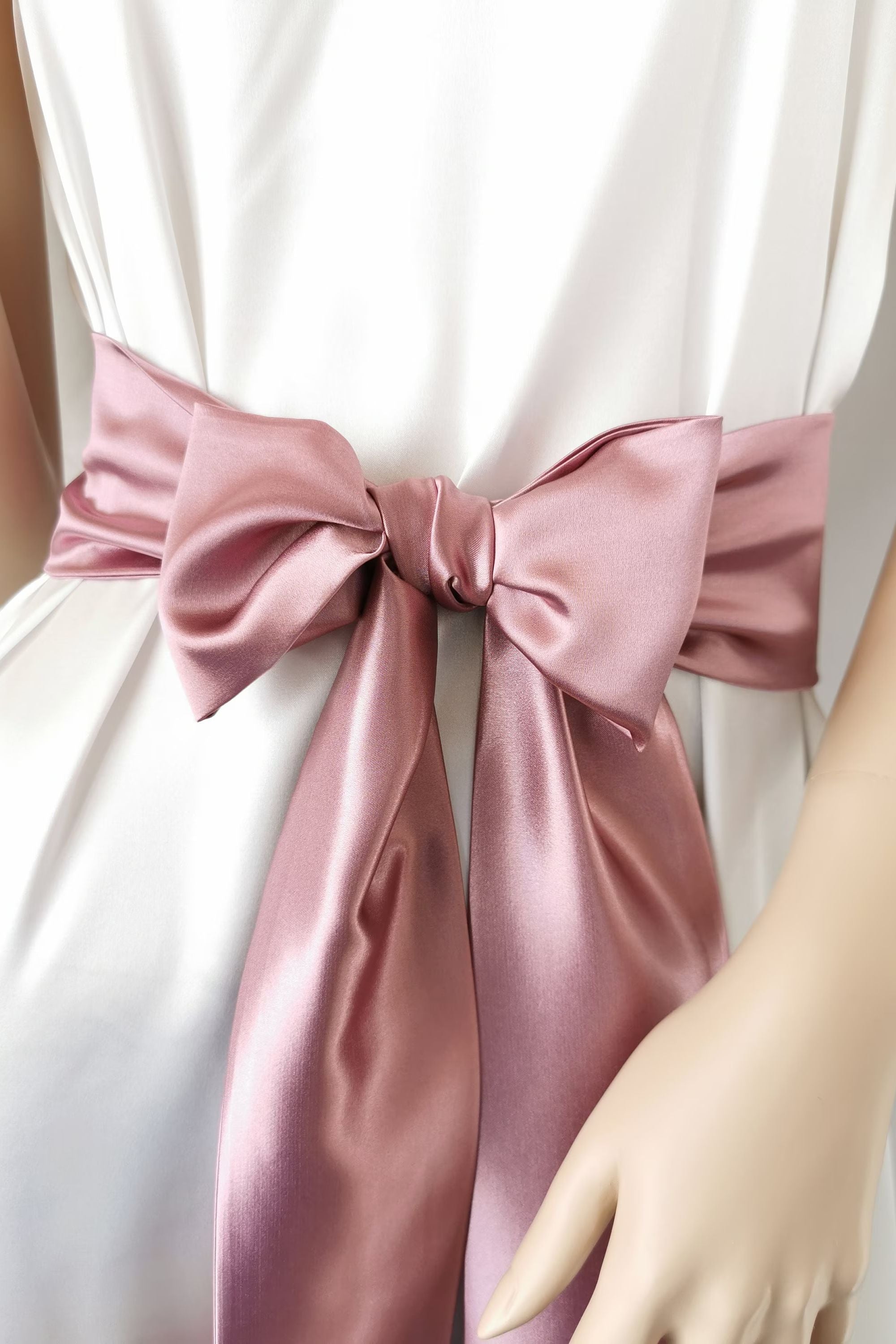 Rich dark pink satin bow belt for festive and feminine outfits