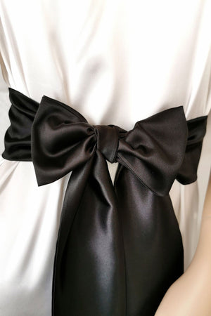 Classic black satin waist belt with flowing bow tails