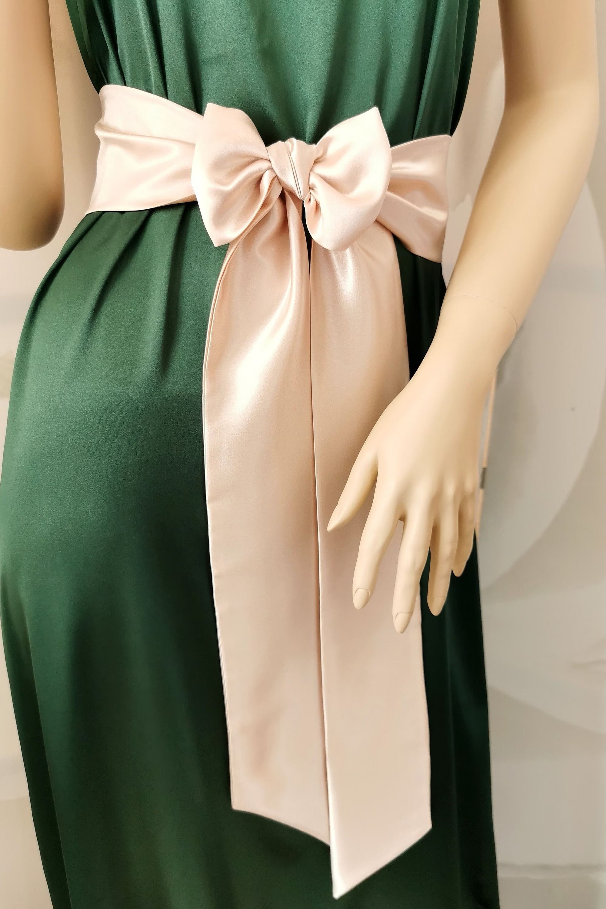 Beige satin sash belt tied at the waist with long elegant tails
