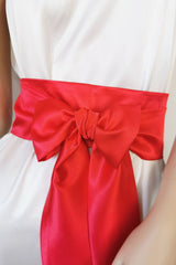 Bright red satin waist belt with long flowing tails