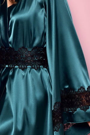 Teal satin robe with black lace details on a pink background
