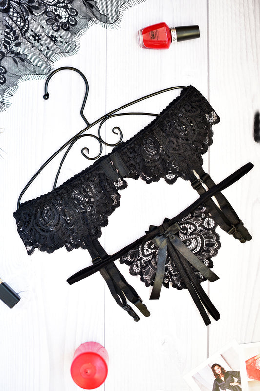 Crotchless panties and garter belt in elegant black lace